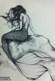 manuscript mermaid back tattoo design