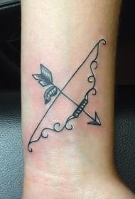 wrist black and white bow and arrow tattoo pattern