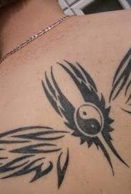 gossip and wing tattoo