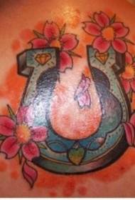 гръб цвят подкова и прасковено цвете татуировка модел