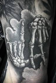 realistic black skull hand tattoo pattern