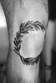 knee engraving style black leaf tattoo pattern