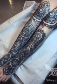 legged black print totem tattoo pattern