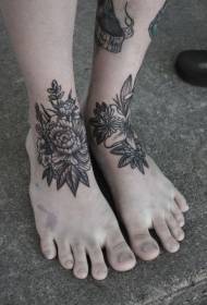 腳背上美麗的黑色灰色花朵紋身圖案
