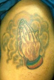 modello di tatuaggio di colore religioso mano preghiera gamba