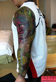 big arm heavy color Prajna tattoo pattern
