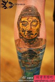 腿部经典的一幅佛头铜像纹身图案