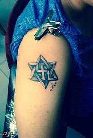 handsome six-pointed star tattoo on the arm