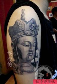 model popular clasic de tatuaj din cap de Buddha din braț piatră