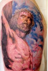 shoulder color tattoo of the crucifixion