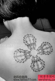 beautiful back-looking vajra tattoo pattern