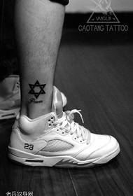 six-pointed star tattoo on the ankle