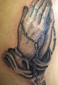 mão de oração marrom cintura e cruz tatuagem padrão