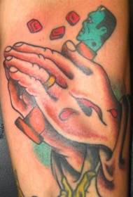 bras couleur mains de prière et modèle de tatouage de gomme