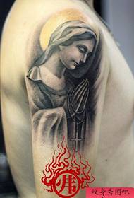 braç patró popular de Madonna del tatuatge