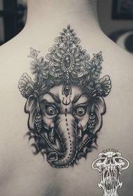 boys back a fierce elephant-like tattoo pattern