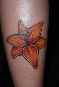 Vrouwelijke benen kleurrijke lelie tattoo foto's