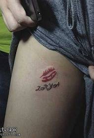Leg lip print with letter tattoo pattern