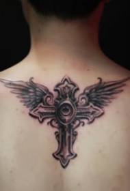 9 bilder av en kors tatuering med vingar