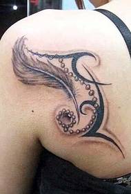 Beautiful feather tattoo on the back