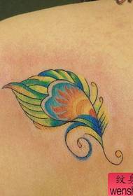 girl's shoulders delicate little feather tattoo pattern