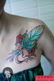 girls beautiful pop feather tattoo pattern on the chest