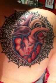 Shoulder colored heart with mandala tattoo pattern