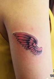 female Child's arm small wings tattoo pattern