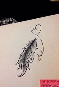 beautiful small black and white feather tattoo manuscript