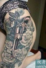 Leg pistol rose tattoo pattern