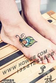 Beautiful feather tattoo on the foot