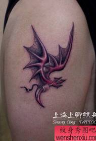 arm a small devil wings tattoo pattern