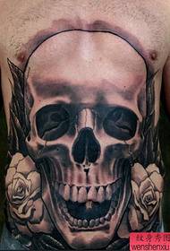 recommended a domineering tattoo on the abdomen