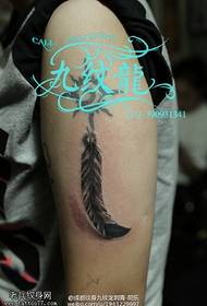 Beautiful feather tattoo pattern on the shoulder