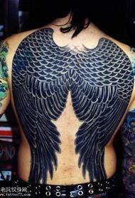 Повна спина чорним малюнком татуювання крила