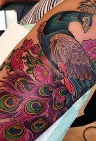 female arm beautiful realistic style peacock tattoo picture
