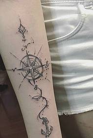 arm fashion look-resistant compass tattoo pattern