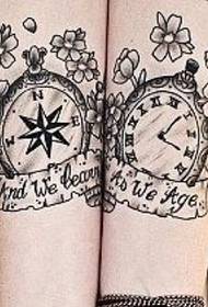 female arm clock totem black and white creative tattoo