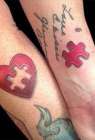 couple wrist love puzzle tattoo