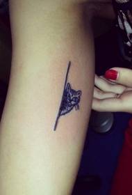 minimalist black kitten arm tattoo pattern