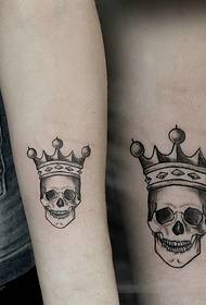 wearing a crown of a small skull couple tattoo pattern