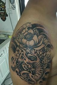 lotus and elephant god combined big arm tattoo pictures