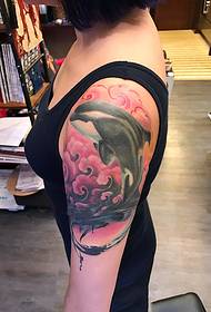 girl arm Personality killer whale painted tattoo