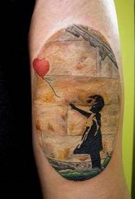 Sentimental girl on the arm stretched out and grabbed the love tattoo figure