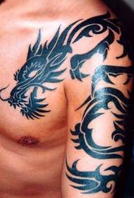 over-the-shoulder dragon tattoo on the left arm shoulder