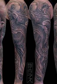arm skalle phoenix svart grå tatuering mönster