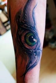 arm on scary eyes colored tattoo pattern