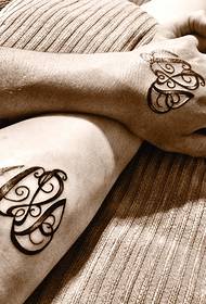 couple arm totem tattoo