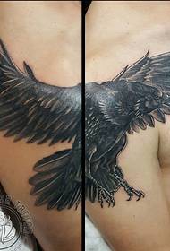 male right hand on the handsome black eagle tattoo picture