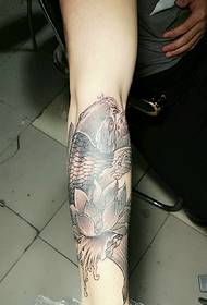 lotus og blekksprut kombinert arm tatoveringsmønster